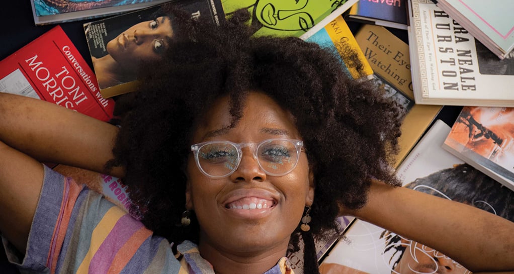 Katie Michell poses with books