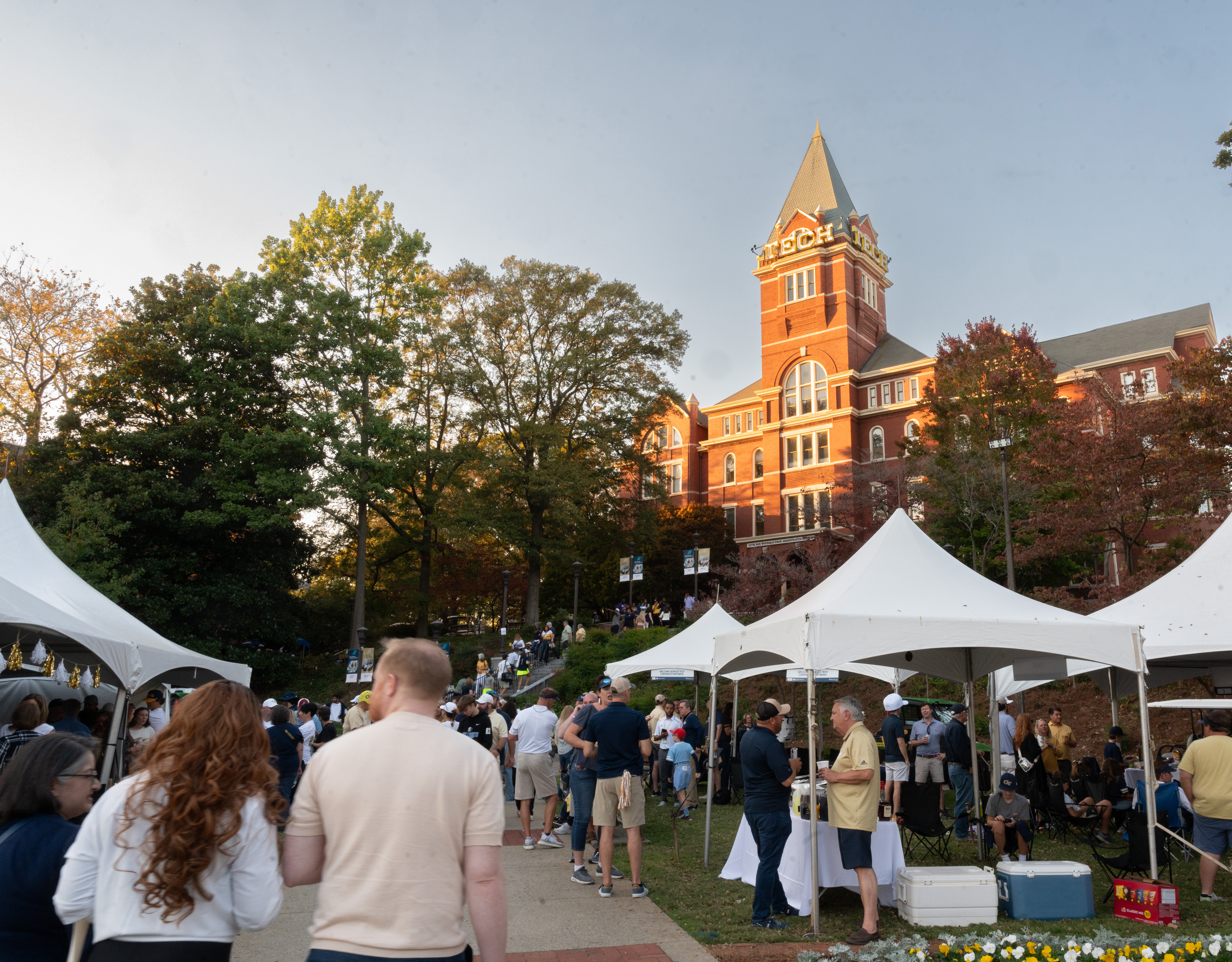 Group of alumni on Tech Tower lawn celebrating