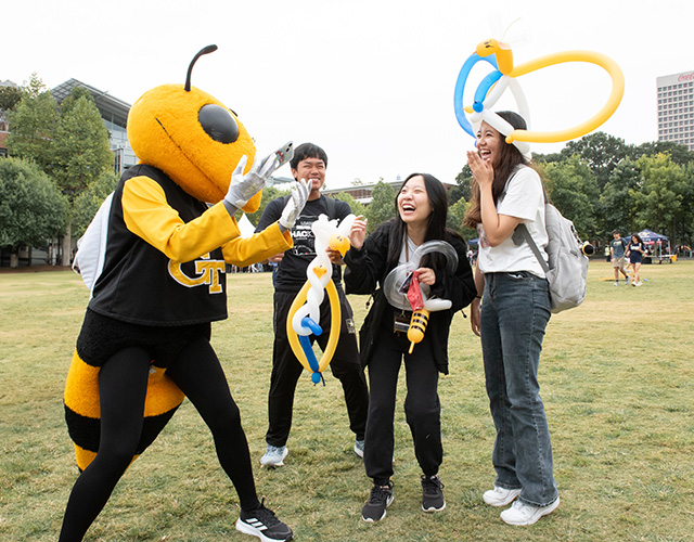 students laughing with Buzz
