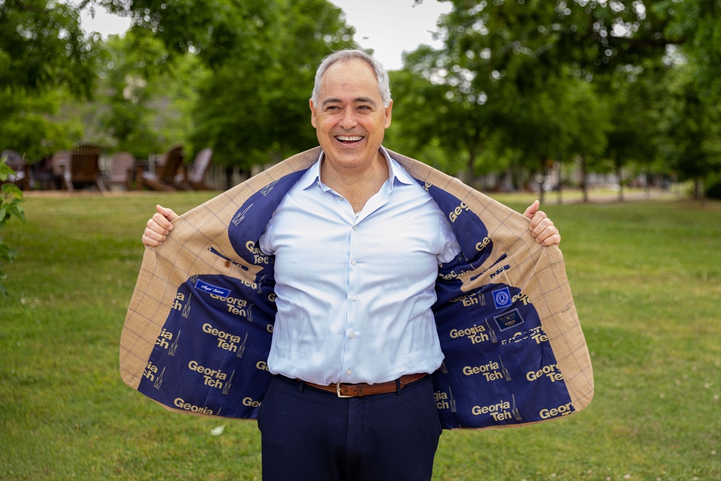Georgia Tech President Angel Cabrera poses with a GT blazer