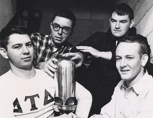 Four student pictured with the stolen whistle