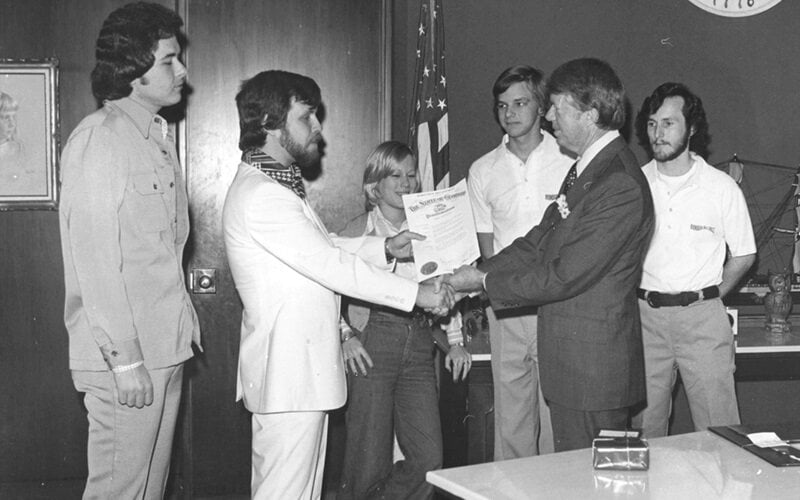 Jimmy Carter handing out a commendation