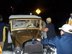 Reck being pushed by a few people