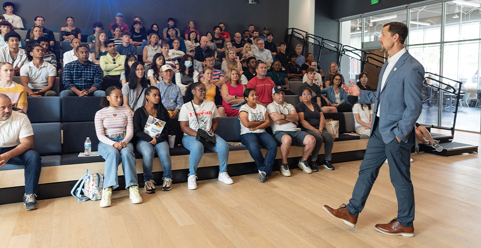 Rick Clark speaking to a group of students