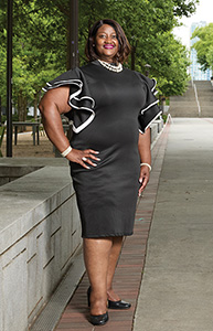 Cynthia posing for a photo on GT Campus