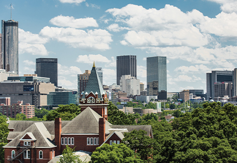 Tech Tower against the Atlanta skyline.