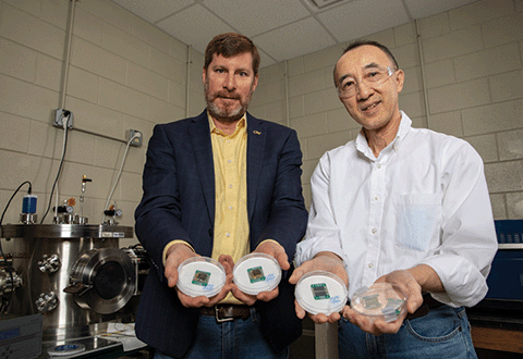 two professors with chips