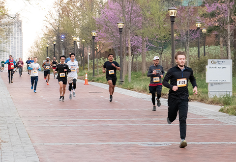 Runners at the 2025 Dean George C. Griffin Pi Mile 5K Road Race 