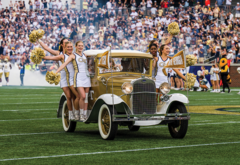 cheerleaders entering Bobby Dodd stadium on the Reck