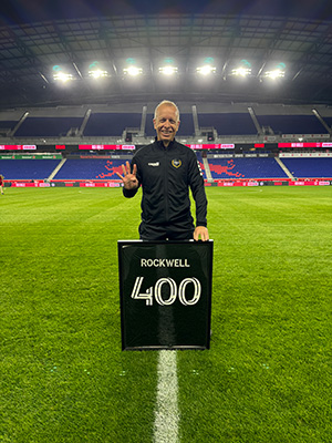Rockwell with his commerative 400th plaque