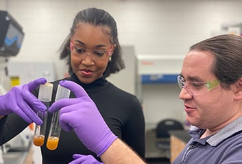 Autumn Peterson and Anthony Burnetti in the lab