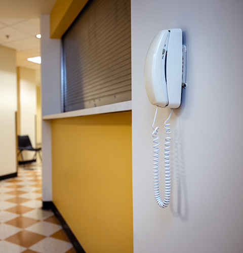 A wall-mounted payphone in the Ford ES&T building