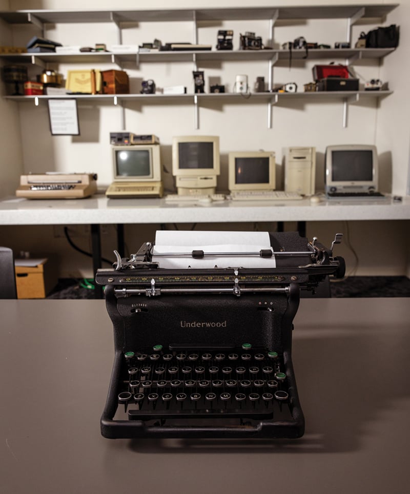 A person using a vintage Macintosh computer in the retroTECH Lab