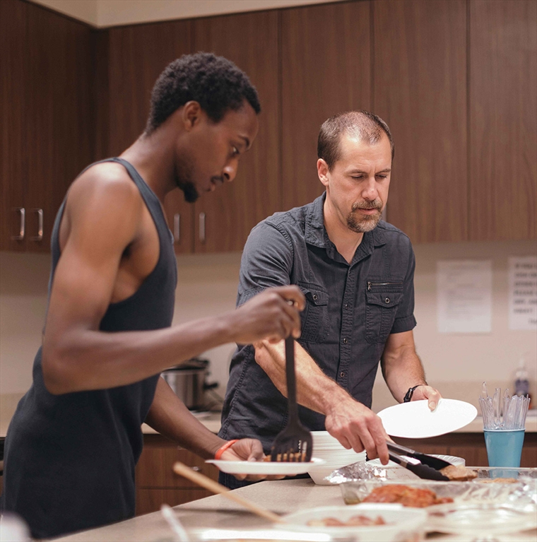 Hope's Path members cooking food