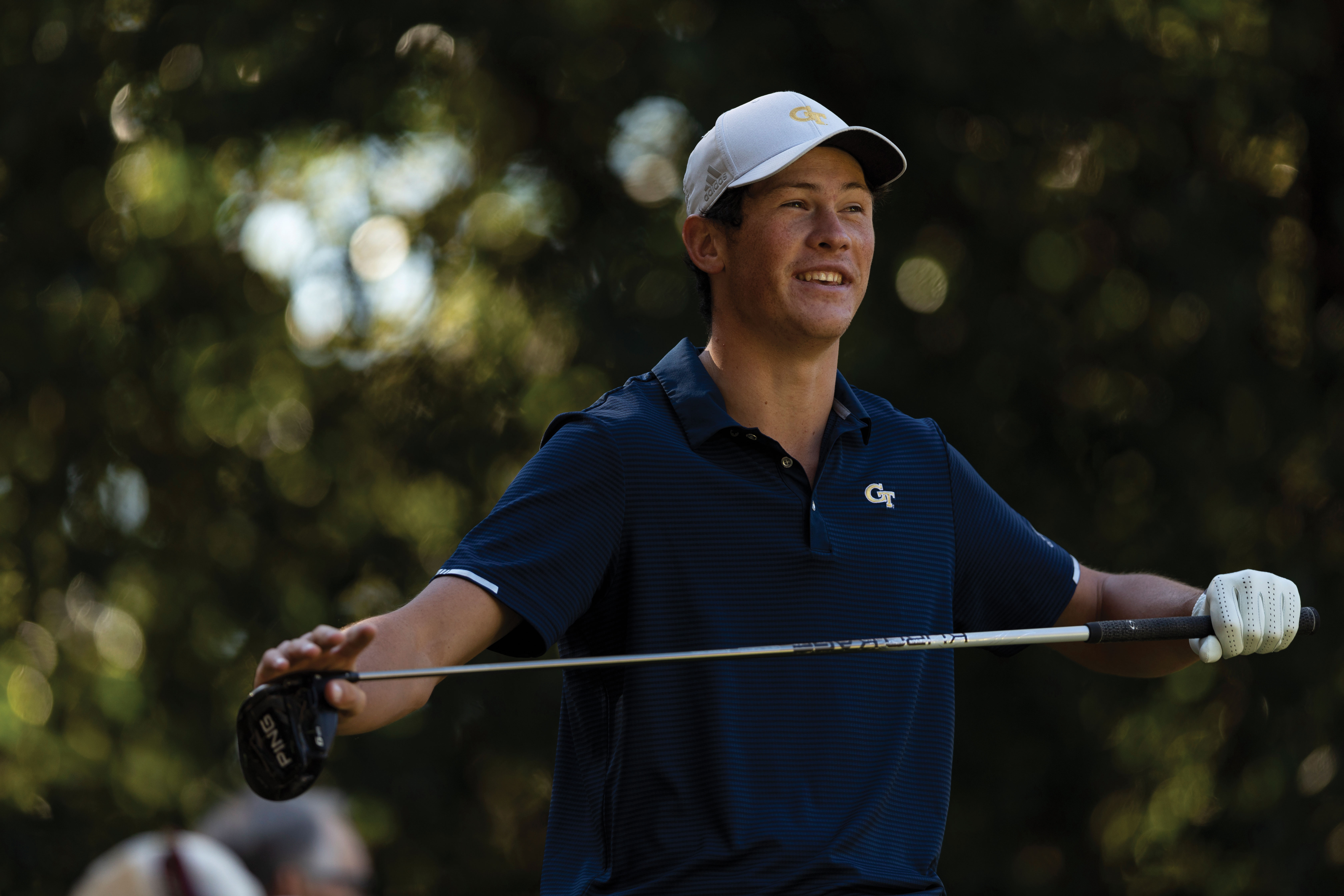 Christo Lamprecht playing golf in GT uniform