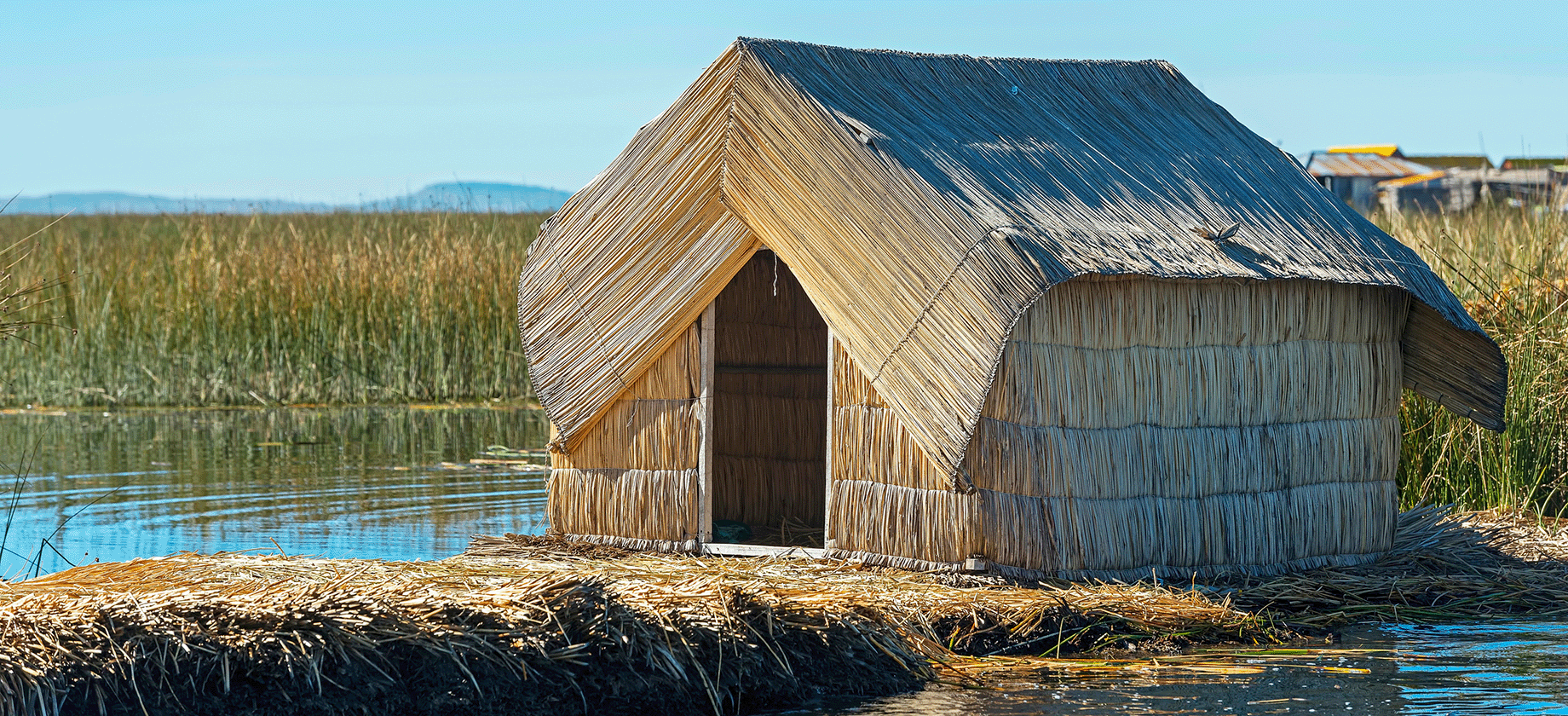 Photo of a hut in a field