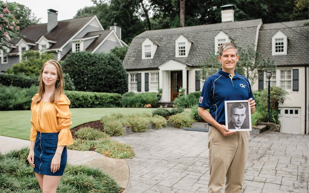 Randy McDow, IE 95, MS PP 03, holding a picture of his grandfather, Randolph “Randy” Whitfield, ME 32, MS ME 34.