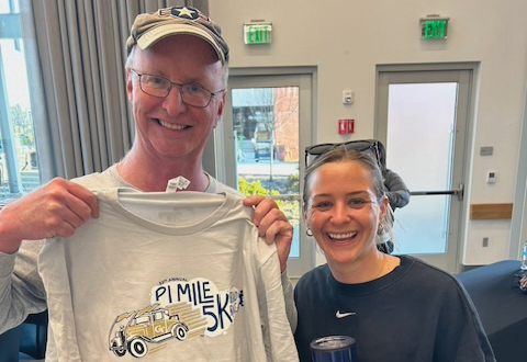 Tech alum with his pi mile shirt