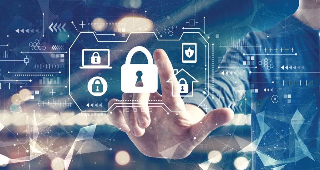 A hand touching a digital screen with a security lock icon.