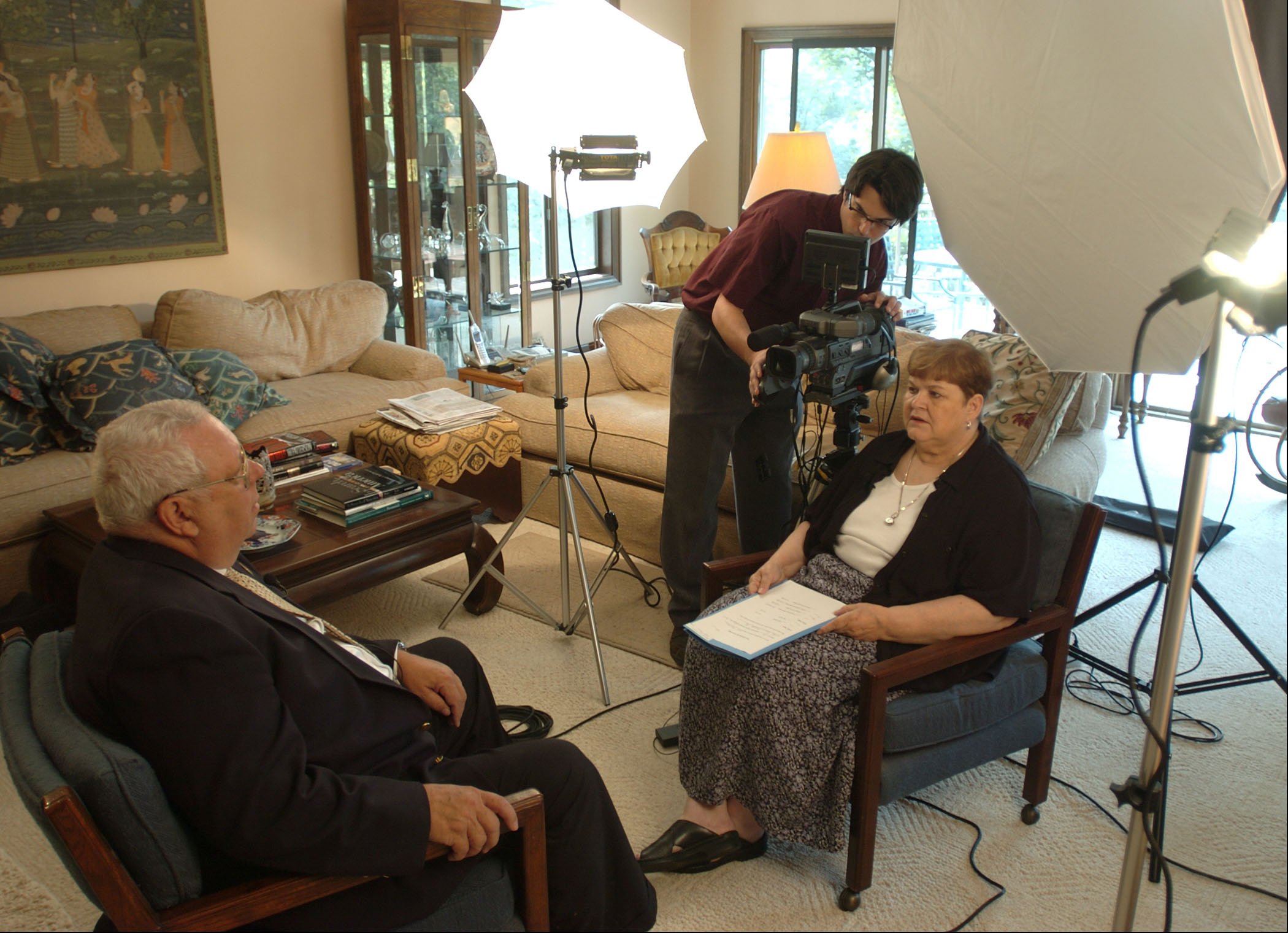 Marilyn Sommers interviewing an alum