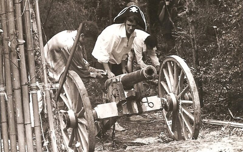 two men with a canon