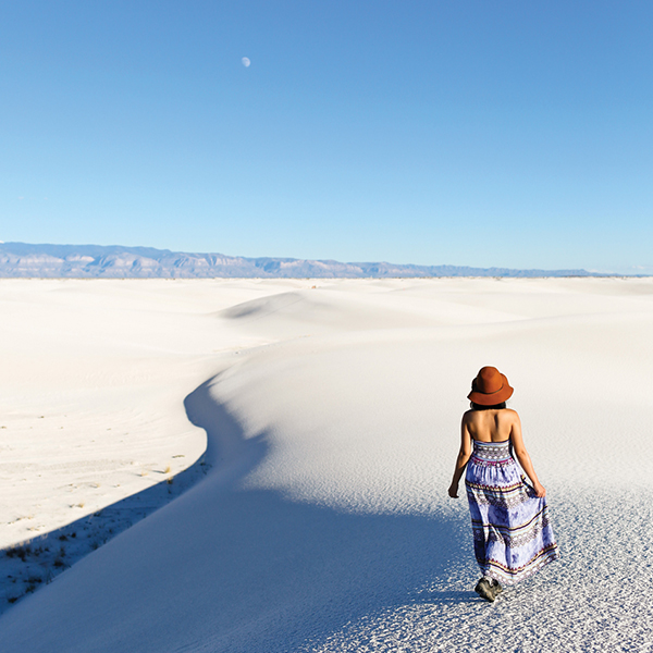 Esther walking on sand dunes